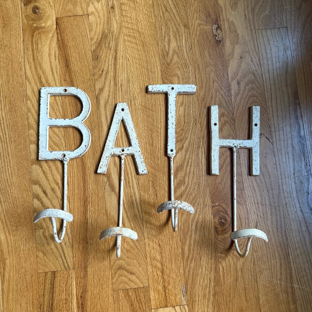 Anthropologie off white metal with patina; ‘BATH' Wall Hooks